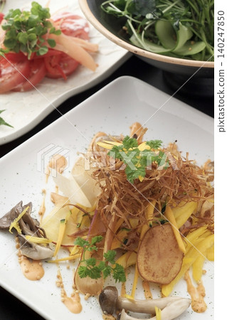 Fried burdock root salad Fried burdock root salad 140247850
