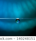 The sight of raindrops hanging in the darkness is mystical and beautiful. 140248151
