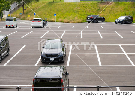 Cars parked in the park's parking lot 140248240