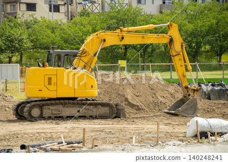 Hydraulic excavator placed at the construction site 140248241