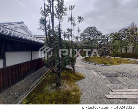 A beautiful Japanese garden with dry landscape water. A beautiful Japanese garden with dry landscape water. 140248326