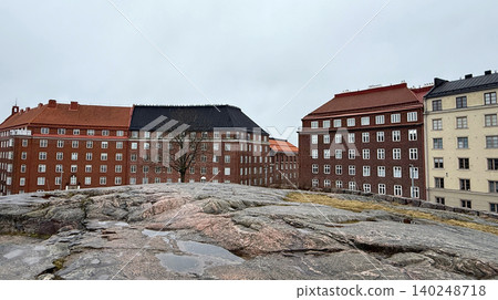 HELSINKI, FINLAND APRIL 6, 2026: Temppeliaukio rock church roof top Architecture with historical building surround in Helsinki Finland HELSINKI, FINLAND APRIL 6, 2026: Temppeliaukio rock church roof top Architecture with historical building surround in Helsinki Finland 140248718
