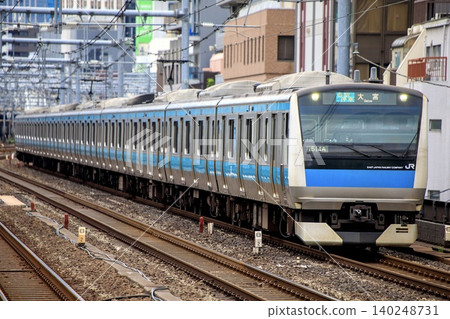 E233 series train running near Okachimachi Station on the Keihin-Tohoku Line. E233 series train running near Okachimachi Station on the Keihin-Tohoku Line. 140248731