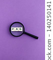 Magnifying glass finding faq letters on purple background 140250141