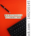 Workforce planning concept with keyboard and pen 140250145