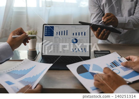 Business team reviewing accounting financial reports and dashboard charts on laptop and tablet during office meeting, supporting data analysis, budget planning, financial management, and reporting Business team reviewing accounting financial reports and dashboard charts on laptop and tablet during office meeting, supporting data analysis, budget planning, financial management, and reporting 140251314