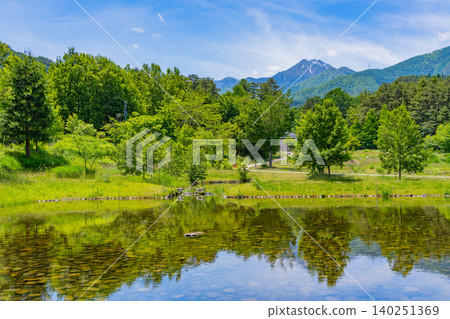 [Nagano Prefecture] National Alps Azumino Park: View of the Northern Alps from the waterside rest area 140251369