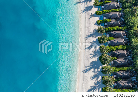Gorgeous aerial Maldives luxury villas powdery white sand palm shadows turquoise lagoon breathtaking resort top view tropical paradise serene idyllic coastal escape dreamy vibrant exotic getaway Gorgeous aerial Maldives luxury villas powdery white sand palm shadows turquoise lagoon breathtaking resort top view tropical paradise serene idyllic coastal escape dreamy vibrant exotic getaway 140252180