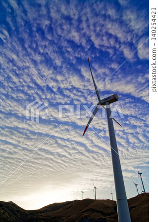 Aso Nishihara Wind Farm: Wind turbines at dawn Aso Nishihara Wind Farm: Wind turbines at dawn 140254421