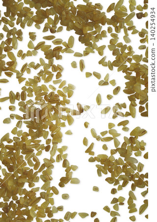 Bulgur wheat groats scattered top view flat lay. Vertical Bulgur wheat groats scattered top view flat lay. Vertical 140254934