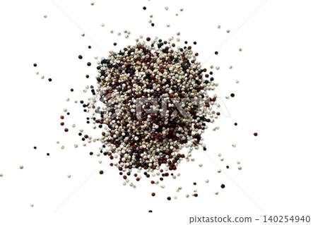 Pile of tricolor quinoa seeds top view Pile of tricolor quinoa seeds top view 140254940