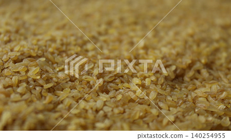 Close up bulgur wheat groats selective focus texture 140254955