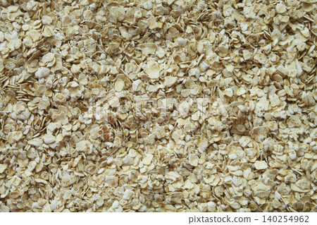 Oatmeal flakes macro texture top view Oatmeal flakes macro texture top view 140254962