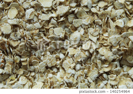 Oatmeal flakes macro texture top view Oatmeal flakes macro texture top view 140254964