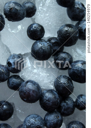 Fresh blueberries on crushed ice macro top view Fresh blueberries on crushed ice macro top view 140254979