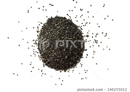 Pile of tricolor quinoa seeds top view 140255012