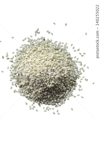 Pile of white sesame seeds top view Pile of white sesame seeds top view 140255022