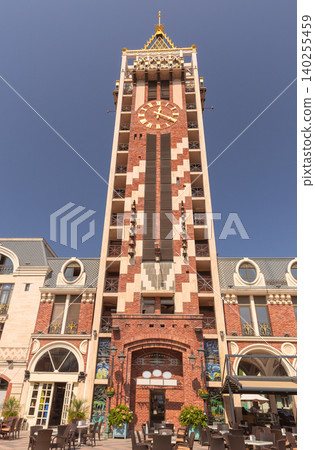 Clock tower of Piazza Square surrounded by historic style architecture in central Batumi, Georgia. 140255459
