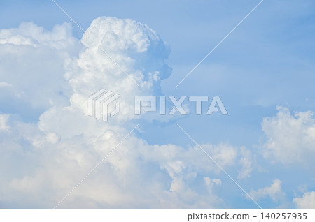 Big fluffy white clouds with the blue sky. Dramatic cloudscape. Nature scene. Nature background. Big fluffy white clouds with the blue sky. Dramatic cloudscape. Nature scene. Nature background. 140257935