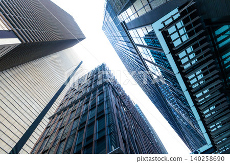 Landscape of the office town looking up at a skyscraper Landscape of the office town looking up at a skyscraper 140258690