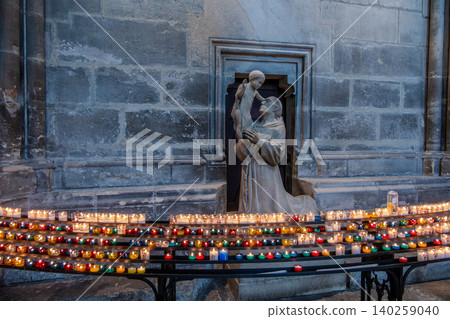 Saint Anthony of Padua Statue with Votive Candles in Notre Dame de Reims Cathedral Saint Anthony of Padua Statue with Votive Candles in Notre Dame de Reims Cathedral 140259040