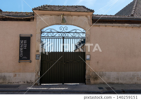 Champagne Fedyk estate entrance with stone arch and iron gate in Hautvillers France Champagne Fedyk estate entrance with stone arch and iron gate in Hautvillers France 140259151