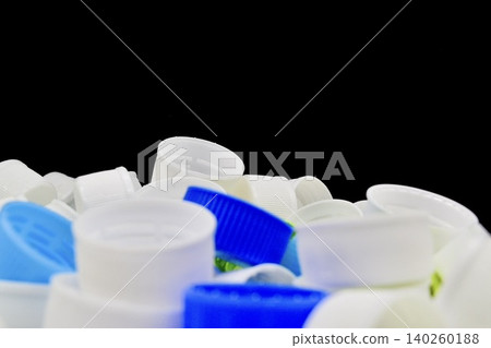 Plastic bottle cap (black background) Plastic bottle cap (black background) 140260188