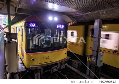 A Tokyo Metro Ginza Line 1000 series train stopped at Asakusa Station. A Tokyo Metro Ginza Line 1000 series train stopped at Asakusa Station. 140260638