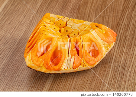 Fresh jackfruit slice on wooden surface Fresh jackfruit slice on wooden surface 140260773
