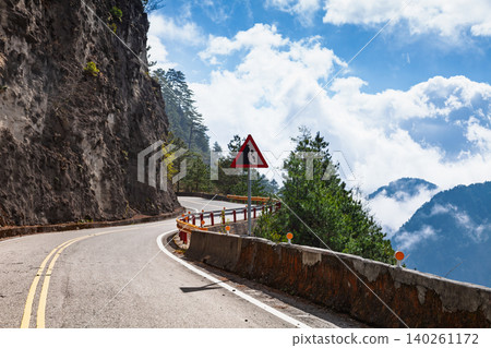 Rockfall Warning on Mountain Road in Taiwan Rockfall Warning on Mountain Road in Taiwan 140261172