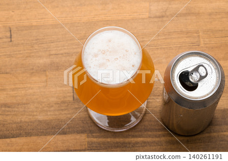 Opened Beer Can Beside Full Glass Opened Beer Can Beside Full Glass 140261191