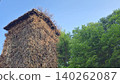 Overgrown Tower Surrounded by Nature Overgrown Tower Surrounded by Nature 140262087