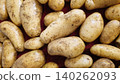 Vertical view of set of potatoes Vertical view of set of potatoes 140262093