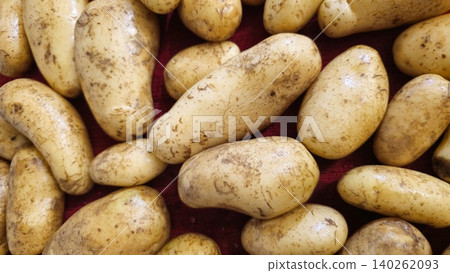 Vertical view of set of potatoes Vertical view of set of potatoes 140262093