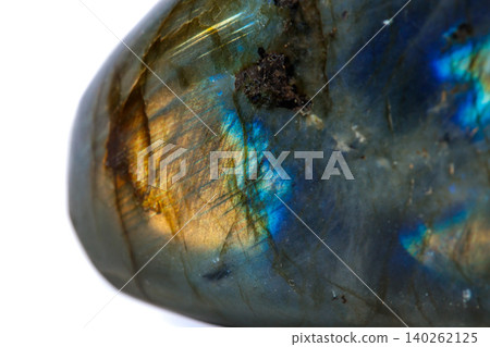 Macro mineral stone Labradorite on white background Macro mineral stone Labradorite on white background 140262125