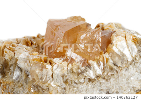 Macro mineral stone  Scheelite on a white background 140262127