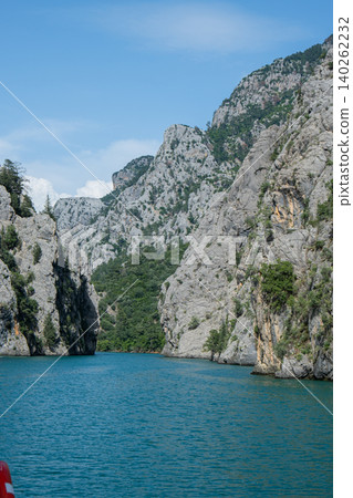 Panoramic Landscape view on green canyon Antalya Turkey with turquoise water mountain cliffs and green forest. Showcasing natural beauty travel tourist destination. Vacation concept 140262232