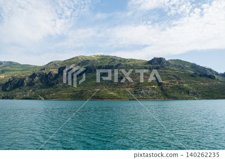 Panoramic Landscape view on green canyon Antalya Turkey with turquoise water mountain cliffs and green forest. Showcasing natural beauty travel tourist destination. Vacation concept Panoramic Landscape view on green canyon Antalya Turkey with turquoise water mountain cliffs and green forest. Showcasing natural beauty travel tourist destination. Vacation concept 140262235
