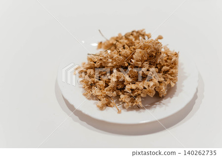 Robinia pseudoacacia, prickly acacia, and white acacia. Dried flowers of Robinia vulgaris for use in medicine. Robinia pseudoacacia, prickly acacia, and white acacia. Dried flowers of Robinia vulgaris for use in medicine. 140262735