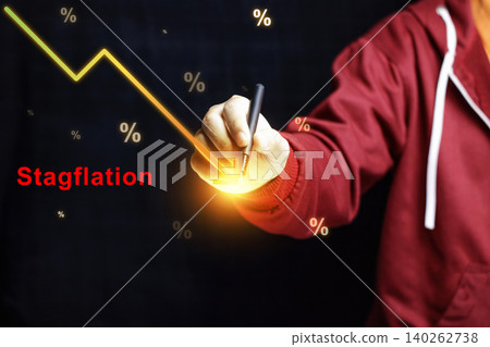 Economic Stagflation Concept with Hand Pointing at Falling Financial Market Graph. Economic Crisis Prediction Concept. High quality photo Economic Stagflation Concept with Hand Pointing at Falling Financial Market Graph. Economic Crisis Prediction Concept. High quality photo 140262738