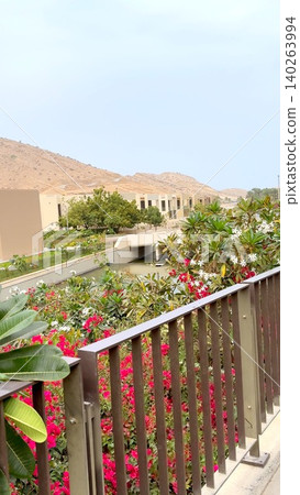 Light Cloudy Before Rain Garden Bridge Travel Destination With Colorful Flowers And Mountain Background, Garden Surrounds Walkway And Garden Enhances Peaceful Atmosphere With Vibrant Natural Details Light Cloudy Before Rain Garden Bridge Travel Destination With Colorful Flowers And Mountain Background, Garden Surrounds Walkway And Garden Enhances Peaceful Atmosphere With Vibrant Natural Details 140263994