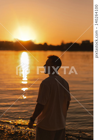 Peaceful Sunset Moment by Calm River Peaceful Sunset Moment by Calm River 140264100