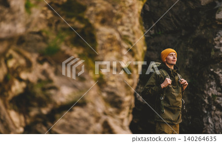 Man Hiker Exploring Canyon with Backpack 140264635