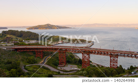 Golden Gate Bridge roadway and San Francisco Bay at sunset Golden Gate Bridge roadway and San Francisco Bay at sunset 140264998