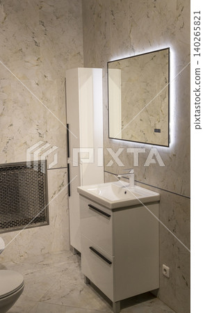Contemporary Bathroom Design Featuring Smart Illuminated Mirror and Sink Contemporary Bathroom Design Featuring Smart Illuminated Mirror and Sink 140265821