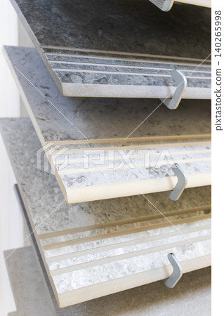 Ceramic Tile Samples Display on Rack in Modern Hardware Showroom Ceramic Tile Samples Display on Rack in Modern Hardware Showroom 140265998