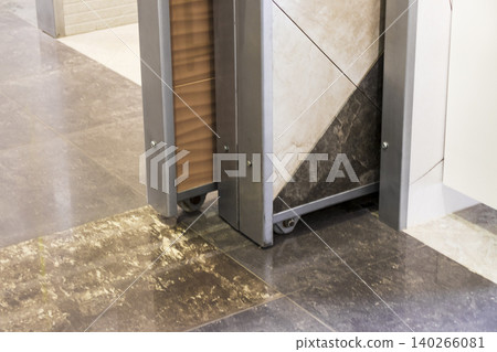 Sliding Ceramic Tile Display Rack on Wheels in Showroom Store Sliding Ceramic Tile Display Rack on Wheels in Showroom Store 140266081