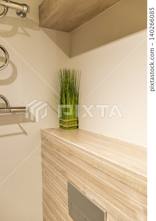 Modern Bathroom Interior Detail with Decorative Green Grass and Wood Tiles Modern Bathroom Interior Detail with Decorative Green Grass and Wood Tiles 140266085