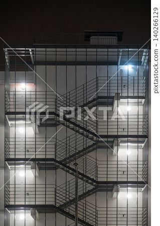 Staircase design on a building at night in a city Staircase design on a building at night in a city 140266129