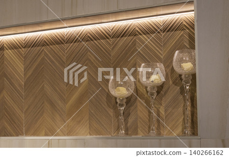 Illuminated Wall Niche Featuring Wood Look Herringbone Pattern and Decor Illuminated Wall Niche Featuring Wood Look Herringbone Pattern and Decor 140266162